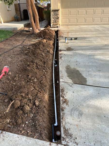 Irrigation valve box and manifold installed underground for a sprinkler system